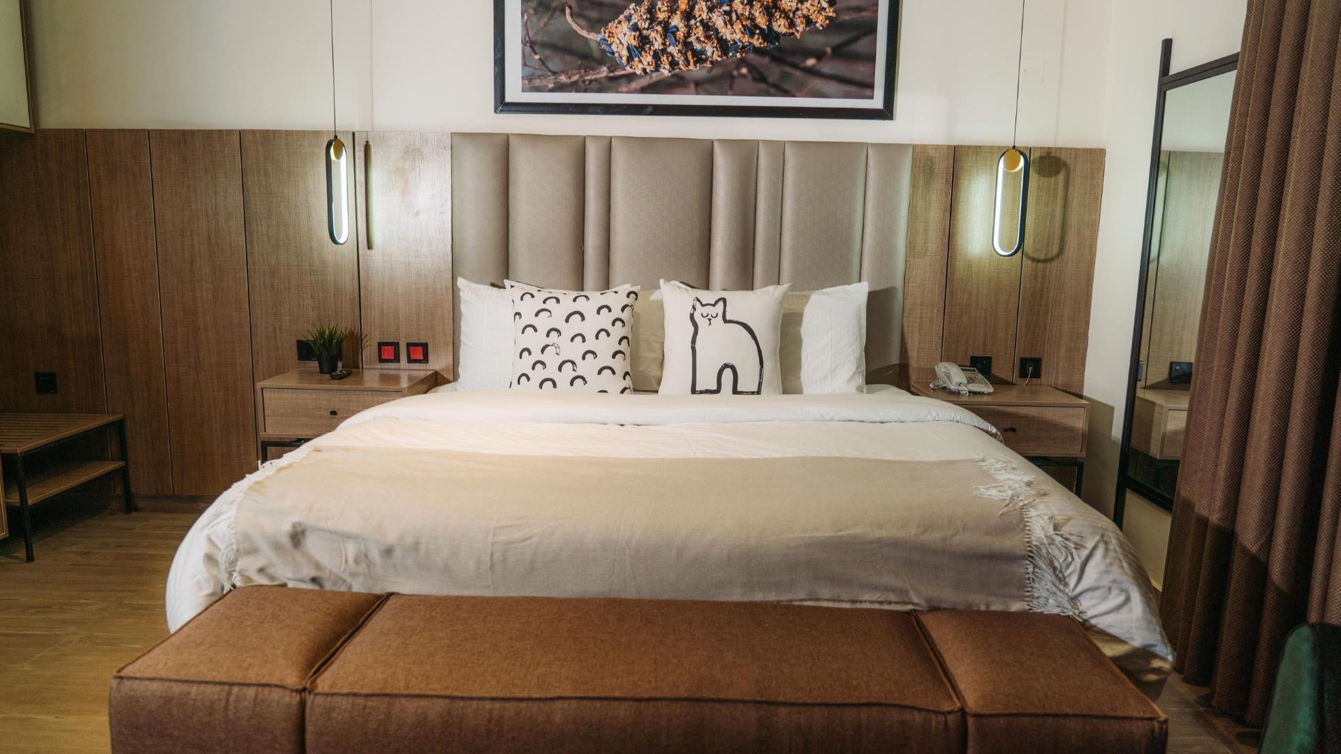Guest room with a king bed at Seven Lugard